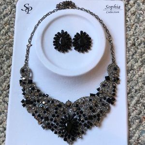 Statement necklace and earrings.